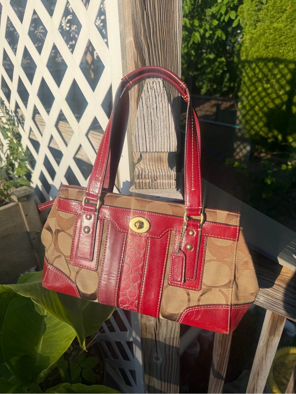 Coach Tan Signature Canvas Shoulder Bag with Red Leather Trim